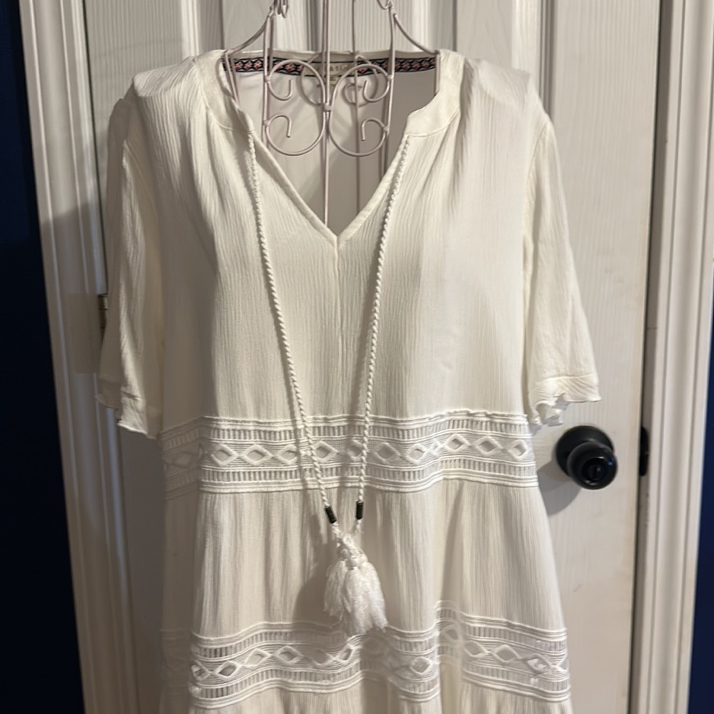 White Dress with Cutwork Designs and Tassle